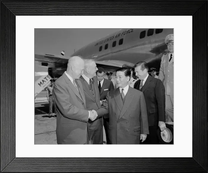 Framed Print : President Eisenhower and John Foster Dulles (from left) greet South Vietnam's President Ngo Dinh Diem at the Washington National Airport. May 8, 1957