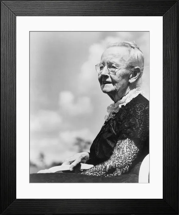 Framed Print : Grandma Moses, born as Anna Mary Robertson (1860-1961), began painting in her seventies and achieved acclaim as a folk painter. Ca. 1950 at age 90 Framed Print : Grandma Moses, born as Anna Mary Robertson (1860-1961), began painting in her seventies and achieved acclaim as a folk painter. Ca. 1950 at age 90