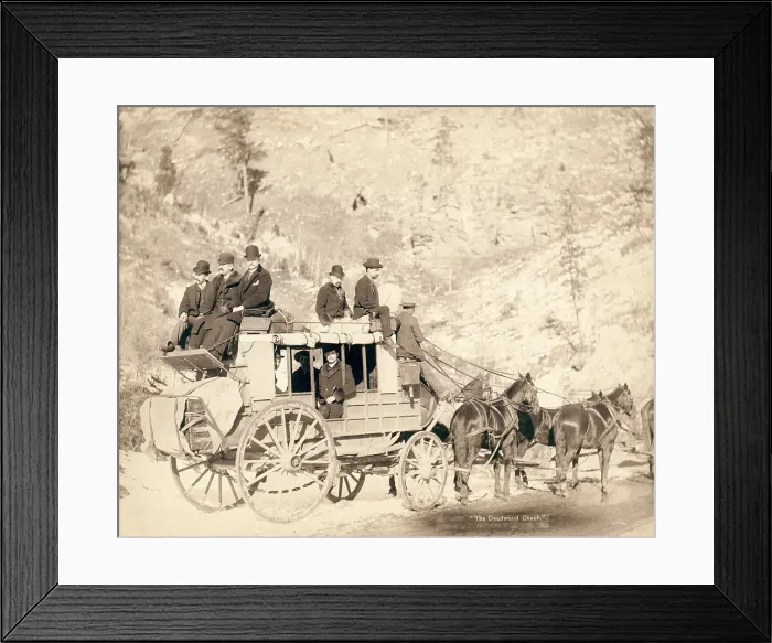 Framed Print : The Deadwood stagecoach fully loaded with nine formally dressed men sitting in and on top of coach, ca. 1885 Framed Print : The Deadwood stagecoach fully loaded with nine formally dressed men sitting in and on top of coach, ca. 1885