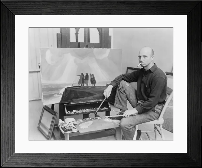 Framed Print : Rockwell Kent (1882-1971), American realist painter at his easel painting THE WRECK. 1929 Framed Print : Rockwell Kent (1882-1971), American realist painter at his easel painting THE WRECK. 1929