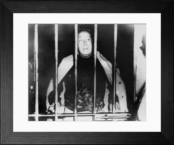 Framed Print : Alfaro Siqueiros (1896-1974), peering from behind bars in a Mexico City jail. The expressionist Mexican Marxist muralist was imprisoned from 1960-64 for his political activities Framed Print : Alfaro Siqueiros (1896-1974), peering from behind bars in a Mexico City jail. The expressionist Mexican Marxist muralist was imprisoned from 1960-64 for his political activities