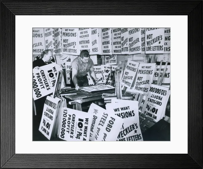 Framed Print : Sign contractor Stanley Sawicki and his helper Stanley Palka getting signs ready for a possible walkout of 89, 000 Chrysler workers, in Detroit, January 1950