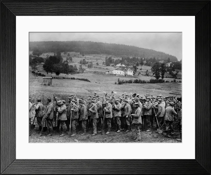Framed Print : German WW1 POWs returning from work armed with only shovels. 1914-18. (BSLOC_2012_4_181)