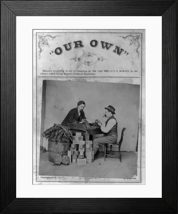 Framed Print : Cigar makers. Two cigarmakers pictured with toabacco leaves and cigar boxes. 1869