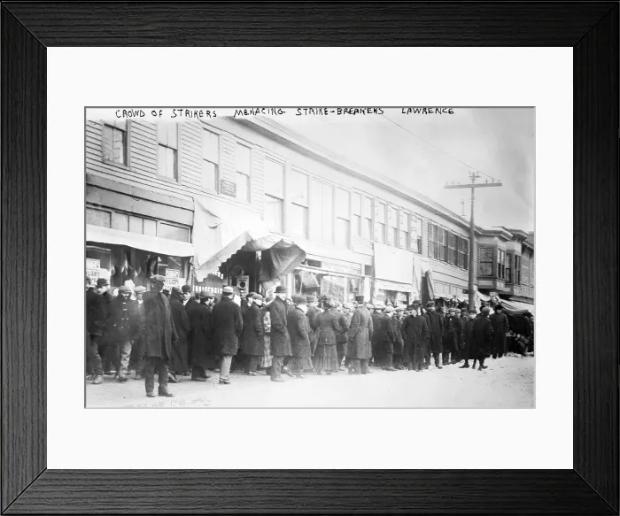 Framed Print : The 'Bread and Roses' strike. Crowd of strikers menacing strike-breakers during the Lawrence textile mill strike. Lawrence, Mass, 1912 Framed Print : The 'Bread and Roses' strike. Crowd of strikers menacing strike-breakers during the Lawrence textile mill strike. Lawrence, Mass, 1912