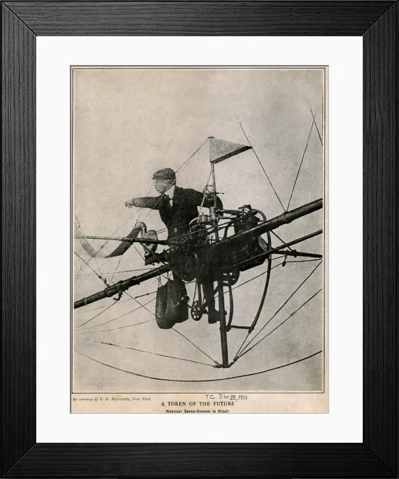 Framed Print : Alberto Santos-Dumont 1873-1932 Brazilian aviator flying his controllable dirigible balloon winning the Deutsch de la Meurthe prize on October 19 1901 for a controlled flight