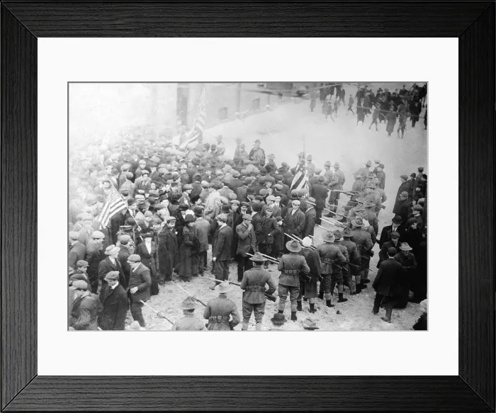 Framed Print : The 'Bread and Roses' strike. National Guardsmen point fixed bayonets at a crowd of strikers during the Lawrence textile mill strike