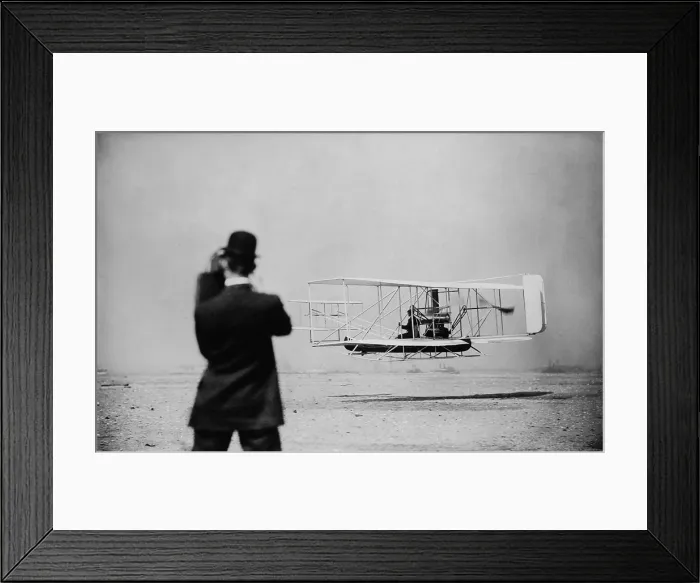 Framed Print : Wilbur Wright 1867-1912 takes off for a flight over New York harbor on Sept. 29 1909