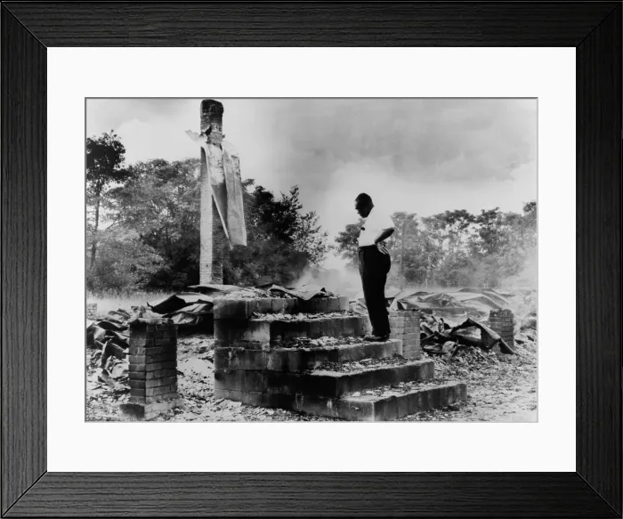 Framed Print : Pastor H.C. McClain looking over the burned ruins of his High Hope Baptist Church, Dawson, Georgia
