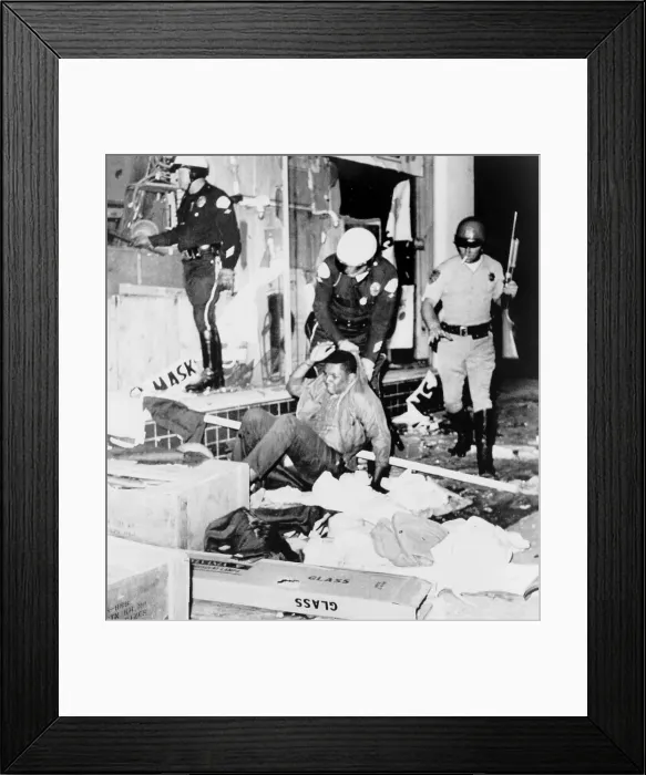 Framed Print : Los Angeles police drag Black youth from a looted store. Aug. 13, 1965 Framed Print : Los Angeles police drag Black youth from a looted store. Aug. 13, 1965