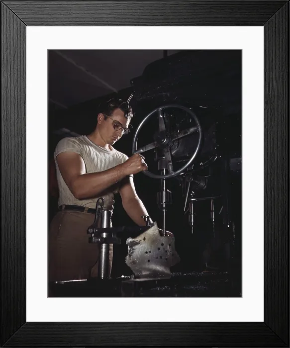 Framed Print : Man operates a drill-press in the North American Aviation's Inglewood, California plant, which built B-25 bombers and Mustang fighters. October 1942