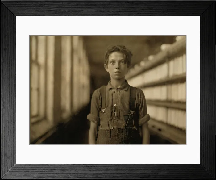 Framed Print : Jo Bodeon, a child laborer in the Chace Cotton Mill of Burlington, Vermont worked in the spinning mule room. May 1909 photo by Lewis Hine Framed Print : Jo Bodeon, a child laborer in the Chace Cotton Mill of Burlington, Vermont worked in the spinning mule room. May 1909 photo by Lewis Hine
