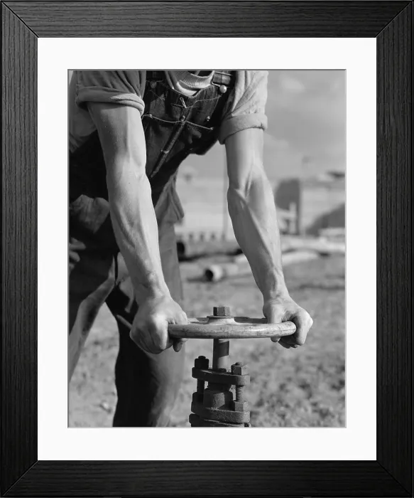 Framed Print : Workman opening valve on a new pipeline of Fort Loudoun Dam, one of the Tennessee Valley Authority public works projects of the New Deal. June 1942