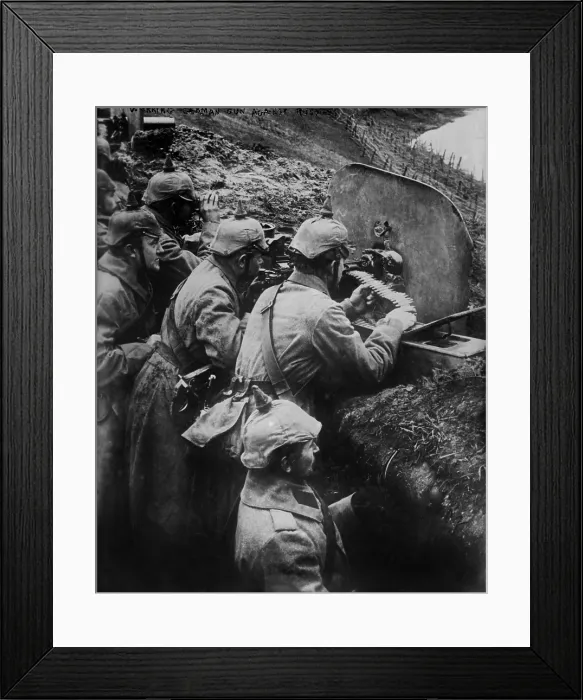 Framed Print : German WW1 machine gun crew firing from a trench on the Eastern Front. 1914-15. (BSLOC_2012_4_127)