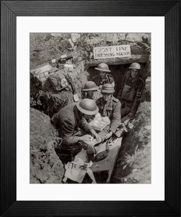 Framed Print : British WW1 soldier treated for a leg wound in Front Line Dressing Station. 1917. (BSLOC_2012_4_62)