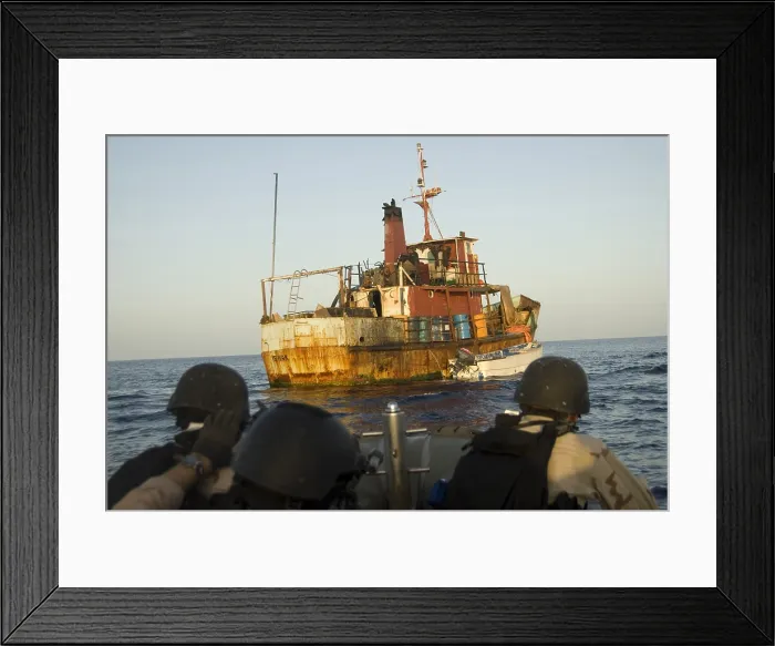 Framed Print : U.S. Navy and Coast Guard personnel approach a suspected pirate mothership in the Gulf of Aden Framed Print : U.S. Navy and Coast Guard personnel approach a suspected pirate mothership in the Gulf of Aden