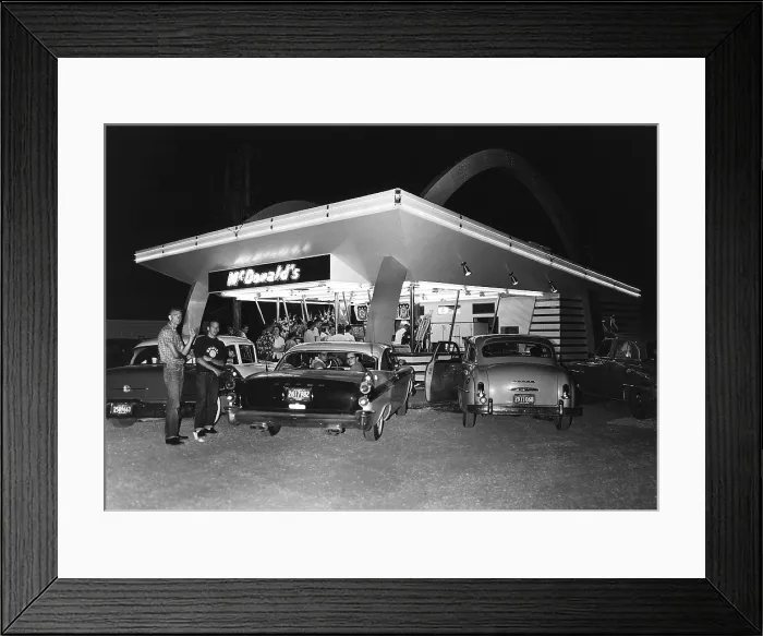 Framed Print : Customers at a the first McDonald's restaurant opened by Ray Kroc in Des Plaines Illinois near Chicago on April 15 1955 the same day that Kroc incorporated his company as Framed Print : Customers at a the first McDonald's restaurant opened by Ray Kroc in Des Plaines Illinois near Chicago on April 15 1955 the same day that Kroc incorporated his company as