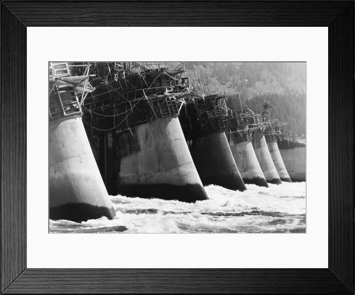 Framed Print : Buttresses of the Bonneville Dam under construction on the Columbia River