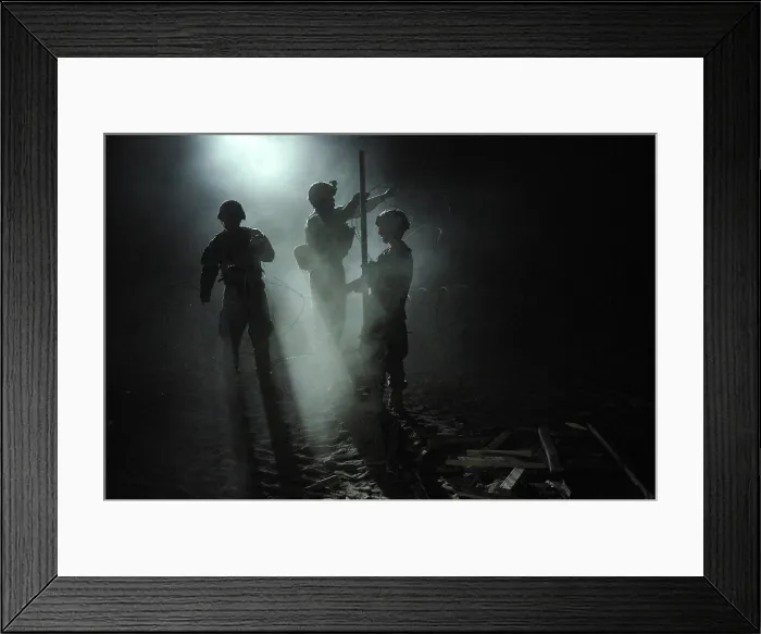 Framed Print : U.S. Army soldiers fortify an Afghan Highway Police checkpoint in Robat Afghanistan by placing razor wire around the perimeter on March 19 2010