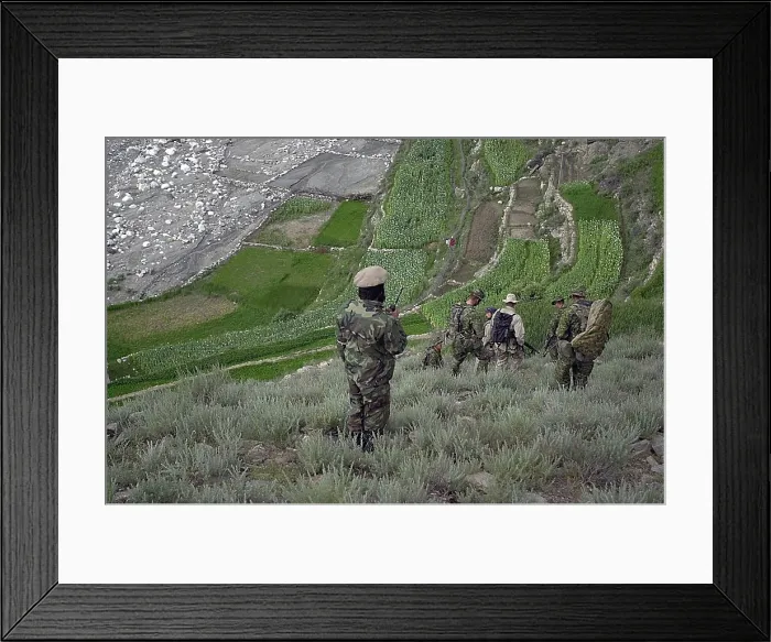 Framed Print : Coalition soldiers from U.S. Canada and Afghanistan looking for Osama Bin Laden Taliban and Al Qaeda forces near the village of Markhanai in the Tora Bora region of Afghanistan