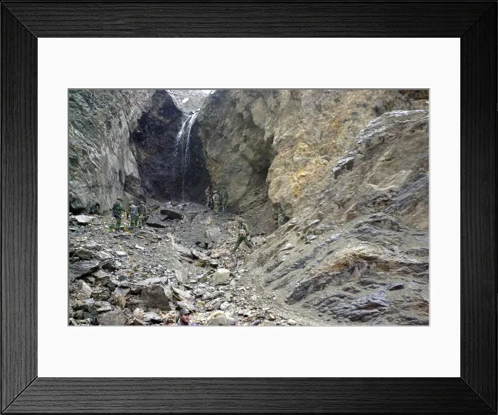 Framed Print : Canadian soldiers searching for Taliban and Al Qaeda forces prepare to blow an opening into the side of a mountain while looking for caves in the Tora Bora region in Afghanistan
