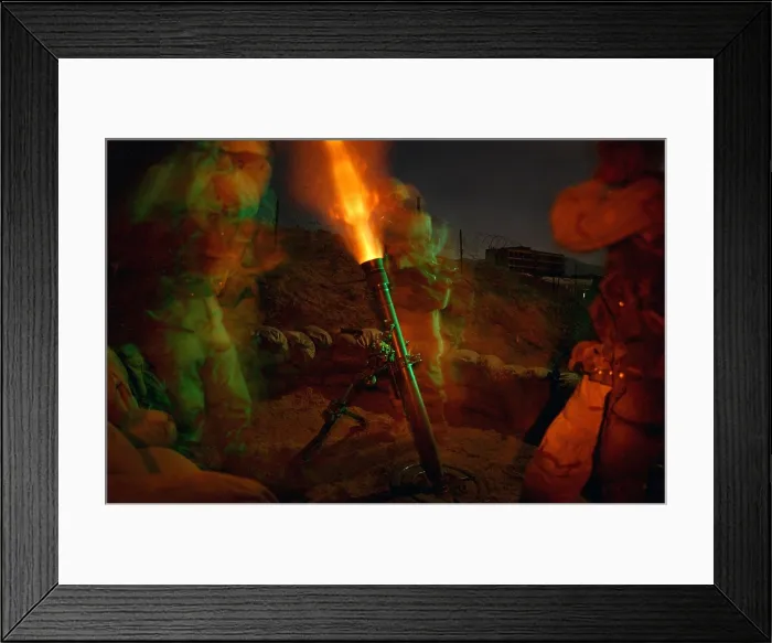 Framed Print : U.S. Army soldiers of 101st Airborne Division fire an illumination round to sink the base plate of their 81mm mortar at a forward operating base near Kabul