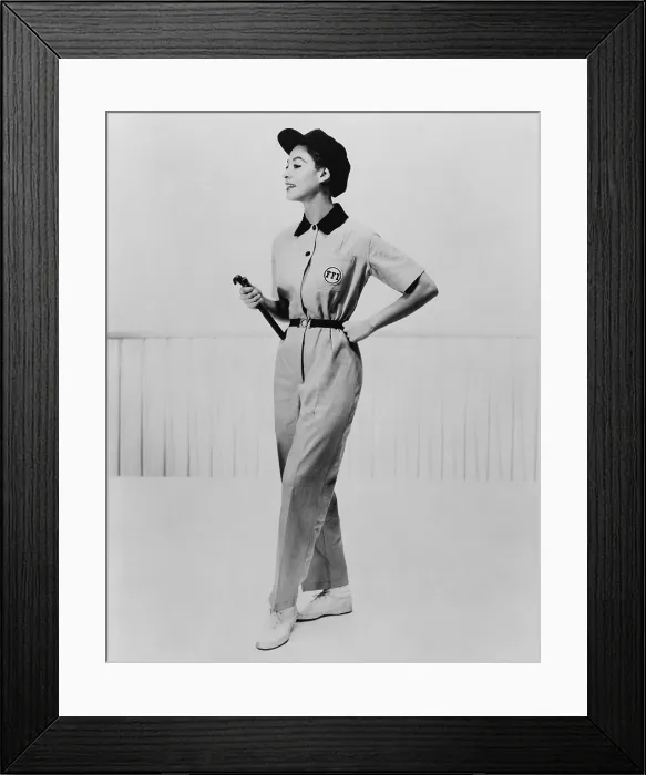 Framed Print : Model wearing coveralls with insignia FFI (Fashion for Industry) and matching cap. 1953