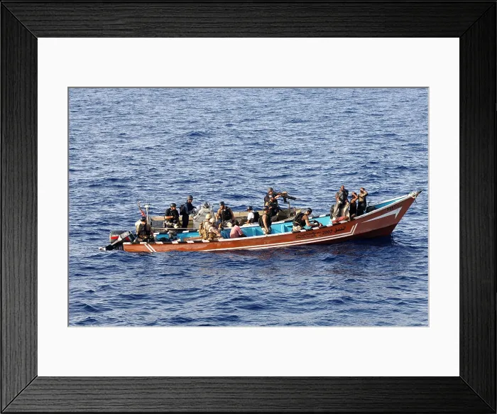 Framed Print : U.S. Coast Guardsmen board and search a skiff in Gulf of Aden suspected of participating in recent pirate activity May 31 2010, Photo by:Everett Collection(BSLOC_2011_6_200)