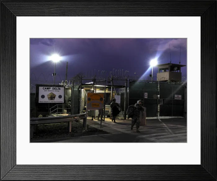 Framed Print : U.S. Soldiers exit a controlled entryway after completing their 12-hour shifts at Camp Delta Guantanamo Bay Naval Base Cuba June 9 2010