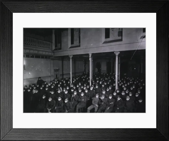 Framed Print : Patients of the at U.S. Army Hospital Number at Royat, France, wearing masks at motion picture show because of an influenza epidemic. 1918
