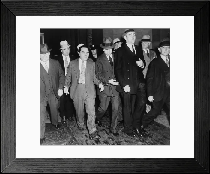 Framed Print : Charles Lucky Luciano (in center with head down), handcuffed to two deputies