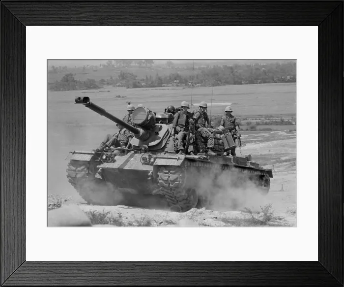 Framed Print : Vietnam War. US Marines riding on an M-48 tank in South Vietnam. 1966