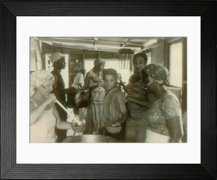 Framed Print : Loretta Cordell serving dinner to Chris Cordell, Richard Anderson, and other residents. People's Temple Agricultural Project. Jonestown, Guyana. Nov. 1978 Framed Print : Loretta Cordell serving dinner to Chris Cordell, Richard Anderson, and other residents. People's Temple Agricultural Project. Jonestown, Guyana. Nov. 1978