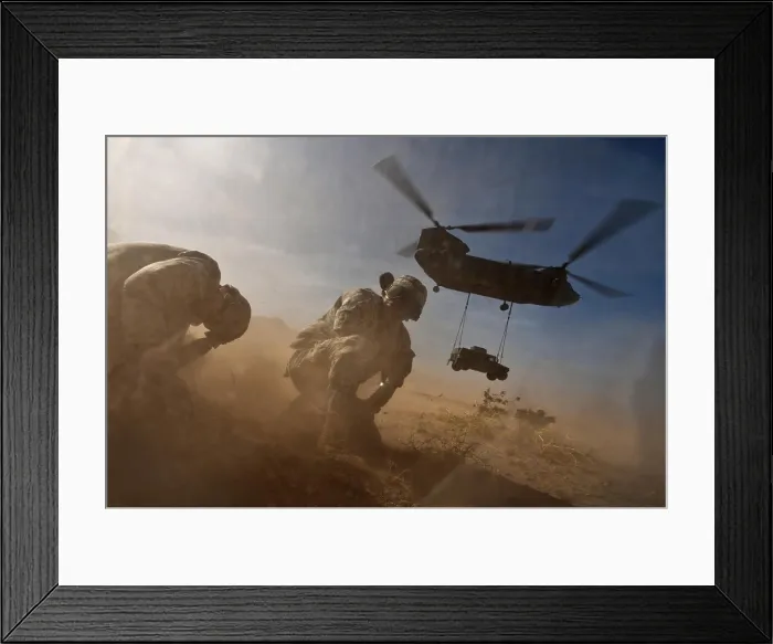Framed Print : Soldiers in the dust of a Chinook helicopter hauling a Humvee at Nellis Air Force Base Nevada. April 15 2011. (BSLOC_2011_12_271)
