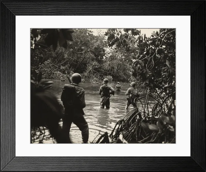 Framed Print : American soldiers wading through water in on an island in the New Georgia Group of the Solomon Islands as part of General Douglass MacArthur's, Operation Cartwheel