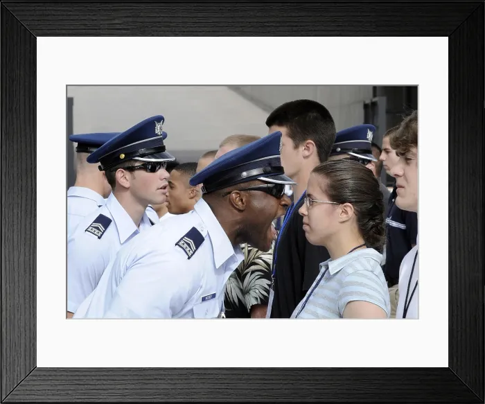 Framed Print : A Cadet 2nd Class yells instructions at new basic cadets during cadet in-processing at the US Air Force Academy in Colorado Springs Colorado. June 25 2009 (BSLOC_2011_12_366) Framed Print : A Cadet 2nd Class yells instructions at new basic cadets during cadet in-processing at the US Air Force Academy in Colorado Springs Colorado. June 25 2009 (BSLOC_2011_12_366)