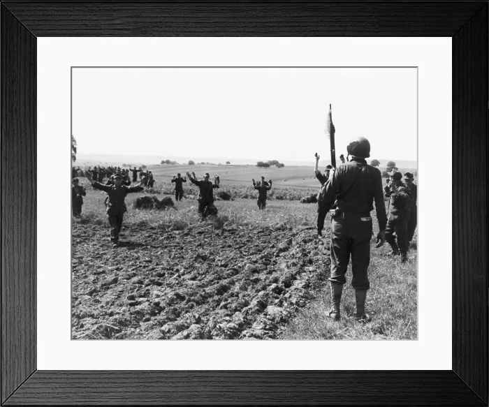 Framed Print : Fifty-six Germans give themselves up to Sgt. Olin Dows, who used his fluent German to talk them into surrendering