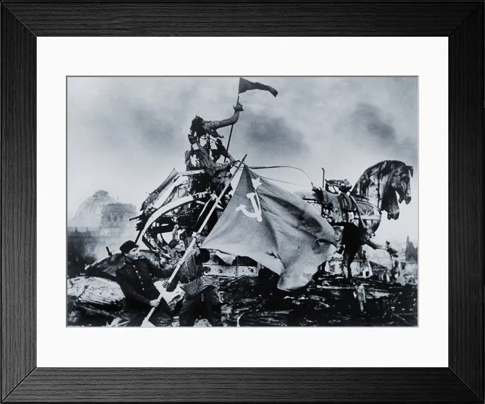 Framed Print : Russian soldiers raise the Soviet Flag next to the battered sculptures of the Brandenburg Gate in the final European battle of World War II. May 2, 1945 photo by Evgenii Khaldei