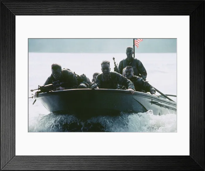 Framed Print : This photograph of six armed US soldiers in a small boat speeding across the water was taken by Corporal Cheresa Clark Framed Print : This photograph of six armed US soldiers in a small boat speeding across the water was taken by Corporal Cheresa Clark