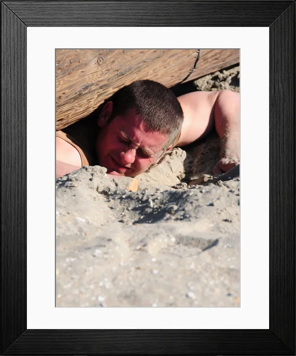Framed Print : US Navy sailor digs under a wood and barbed wire obstacle on the Naval Special Warfare obstacle course. March 2 2011. (BSLOC_2011_12_265) Framed Print : US Navy sailor digs under a wood and barbed wire obstacle on the Naval Special Warfare obstacle course. March 2 2011. (BSLOC_2011_12_265)