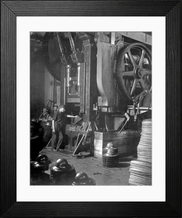 Framed Print : A large power press shaped soldiers steel helmets in the of Hale & Kilburn Corp plant, Hale & Kilburn Corp. Philadelphia. World War I. Ca. 1917 Framed Print : A large power press shaped soldiers steel helmets in the of Hale & Kilburn Corp plant, Hale & Kilburn Corp. Philadelphia. World War I. Ca. 1917