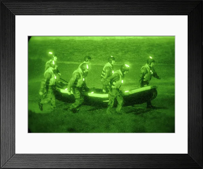 Framed Print : US Sailors assigned to Basic Underwater Demolition / SEAL training class carry an inflatable boat toward the surf in San Diego California. Feb. 25 2010. (BSLOC_2011_12_267) Framed Print : US Sailors assigned to Basic Underwater Demolition / SEAL training class carry an inflatable boat toward the surf in San Diego California. Feb. 25 2010. (BSLOC_2011_12_267)