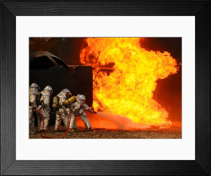 Framed Print : Ohio Air National Guardsmen extinguish an aircraft fire in a training exercise. Phelps Collins Combat Readiness Training Center in Alpena Michigan. Oct. 16 2010