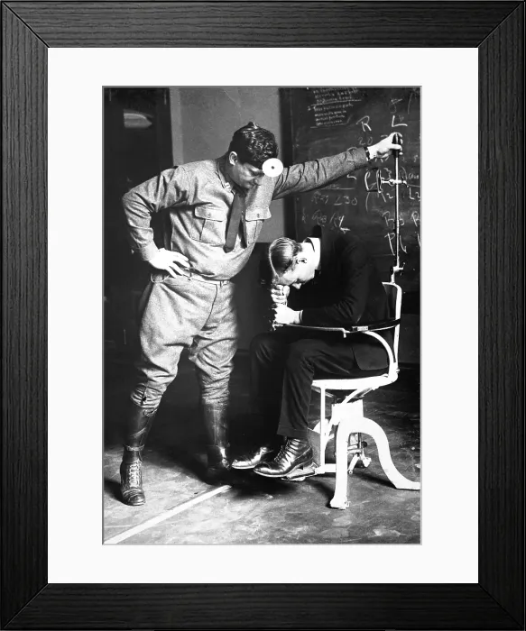 Framed Print : Physical examination of an aviation recruit's to the falling test'. It tests the sixth sense, that of equilibrium, the function of the labyrinth of the internal ear