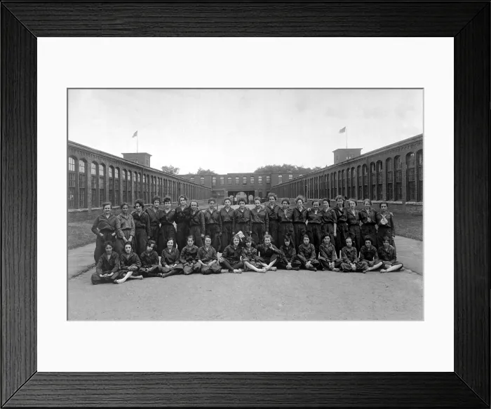 Framed Print : Women war workers in their bloomer work uniforms with sailor suit collars and ties, at the Hope Webbing Company Mill, in Pawtucket, Rhode Island. World War I. Ca. 1918