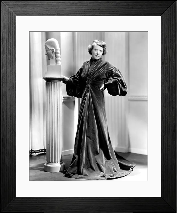 Framed Print : LADY OF SECRETS, Ruth Chatterton, in a garnet-colored cellophane-velvet evening wrap, 1936