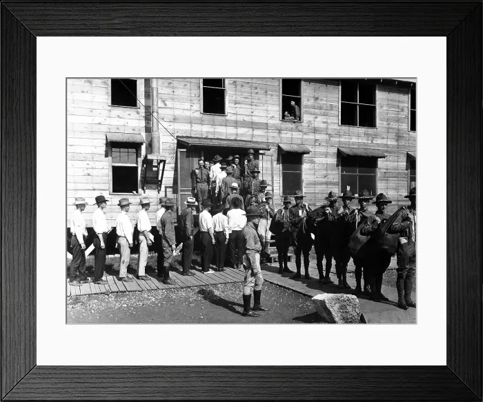 Framed Print : Drafted men reporting for service at Camp Travis, San Antonio, Texas. They enter the base building in the civilian clothing, but leave in their new uniforms. World War I. Ca