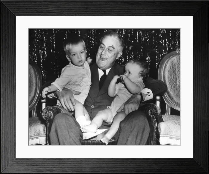 Framed Print : President Roosevelt celebrates Christmas with two of his grandsons. Dec. 24, 1939. At the White house he holds Franklin D. Roosevelt III (left) and John R. Boettiger (right)
