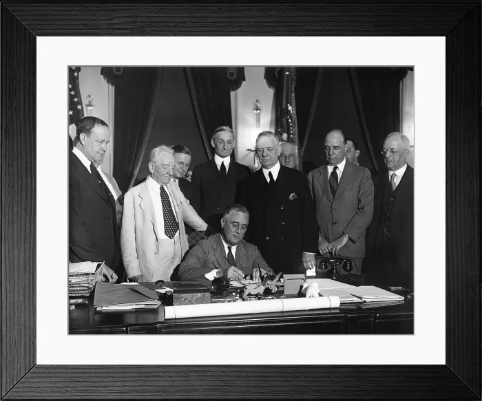 Framed Print : Franklin Roosevelt signs the Glass-Steagall banking reform act. June 16, 1933. Standing behind FDR, L-R: Sen. Allen Barkley; Sen. Thomas Gore (obscured); Sen Framed Print : Franklin Roosevelt signs the Glass-Steagall banking reform act. June 16, 1933. Standing behind FDR, L-R: Sen. Allen Barkley; Sen. Thomas Gore (obscured); Sen