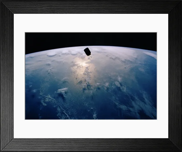 Framed Print : INTELSAT VI, a communication satellite was stranded in an unstable orbit after its March 1990 launch